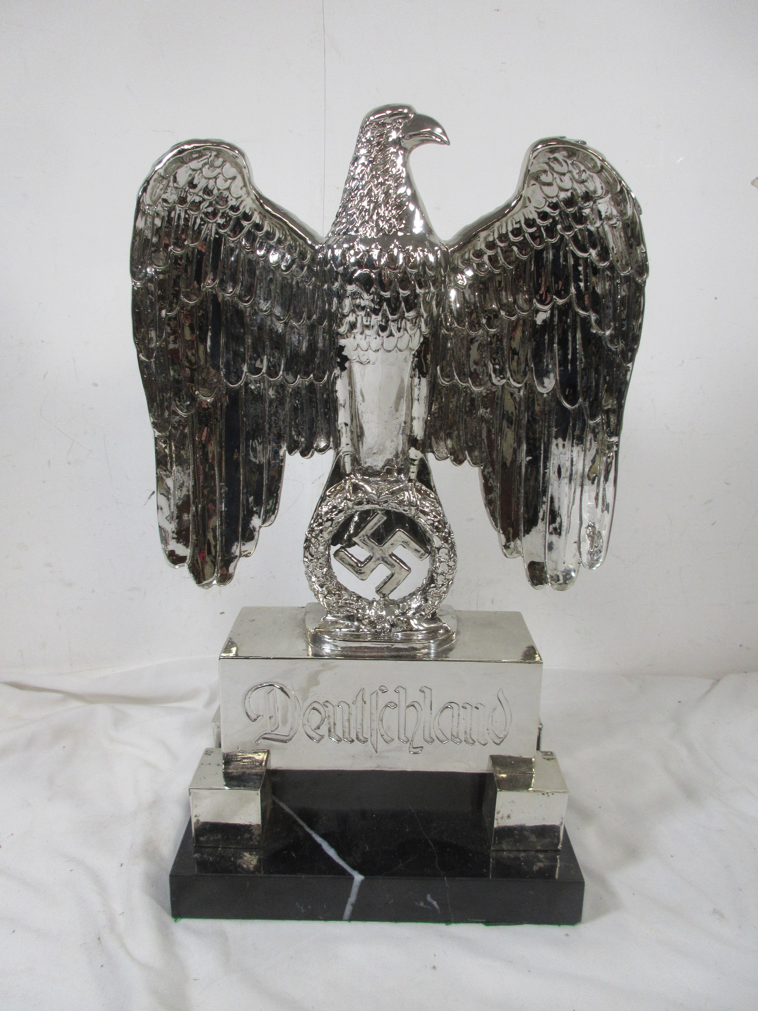 A very large silvered Nazi Parteiadler desk ornament: the eagle with ...