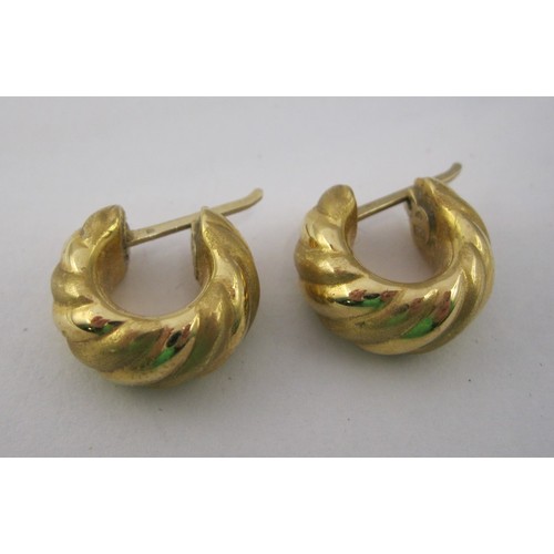 6 - A pair of 18 carat imported gold hollow whirled loop earrings,  combined approx. 3.6g,  stamped 750 ... 