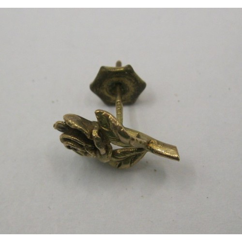 8 - A 9 carat gold rose stem lapel pin,  approx. 1.2g, stamped 9 375.  With a base metal retainer.