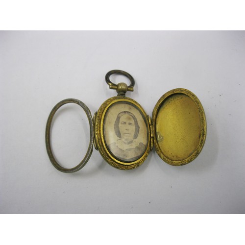 14 - A few items of assorted costume and gold-plated jewellery, including an enamel pendant on chain, a p... 