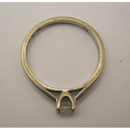 17 - An 18 carat imported white gold solitaire diamond ring,  the diamond 0.20 carat, with a Jewellery Id... 