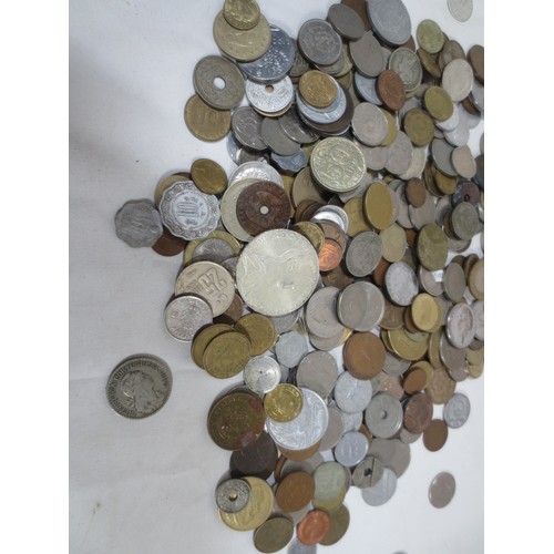53 - Assorted world coins contained in a wooden box including some silver