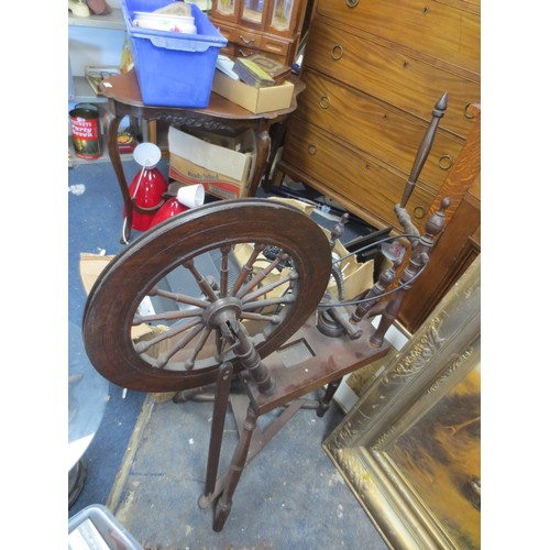 41 - An antique spinning wheel, complete