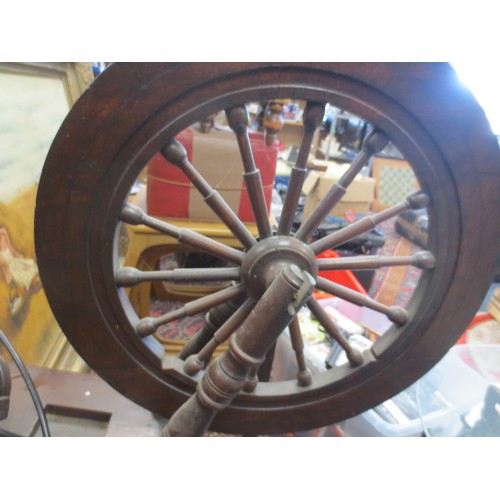 41 - An antique spinning wheel, complete