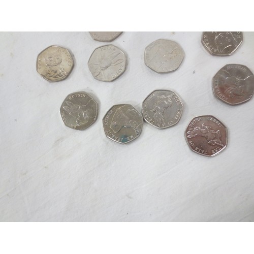 44 - Twelve 2016 and 2017 Beatrix Potter 50 pence coins, and one Isle of Man 50 pence coin Peter Pan All ... 