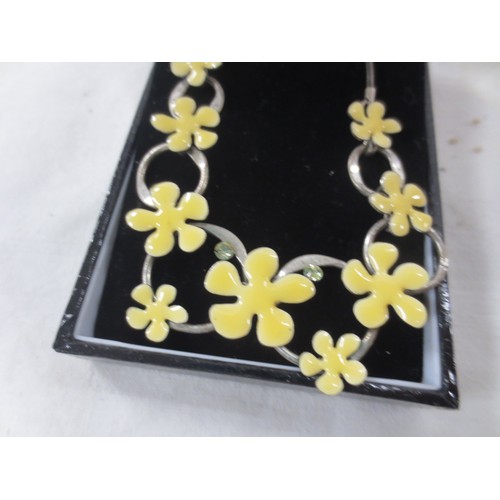 60 - A Pilgrim Danish Design white metal necklace with yellow enamelled flowers, in very good order