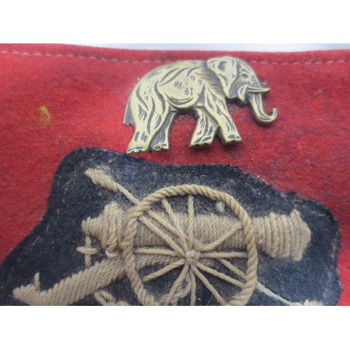 50 - A pair of Royal Artillery armbands and a pair of officer's spurs, one armband with the elephant divi... 