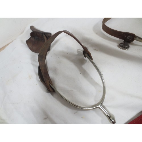 50 - A pair of Royal Artillery armbands and a pair of officer's spurs, one armband with the elephant divi... 