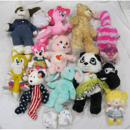 37 - A bag of assorted plush toys, including a Care Bear, a Build-a-Bear, and a Reesee My Little Pony