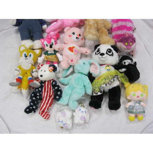 37 - A bag of assorted plush toys, including a Care Bear, a Build-a-Bear, and a Reesee My Little Pony