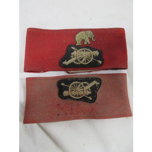 50 - A pair of Royal Artillery armbands and a pair of officer's spurs, one armband with the elephant divi... 