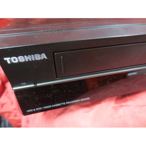 13 - A Toshiba RDXV60 DVD/VHS VCR with HDD Recording