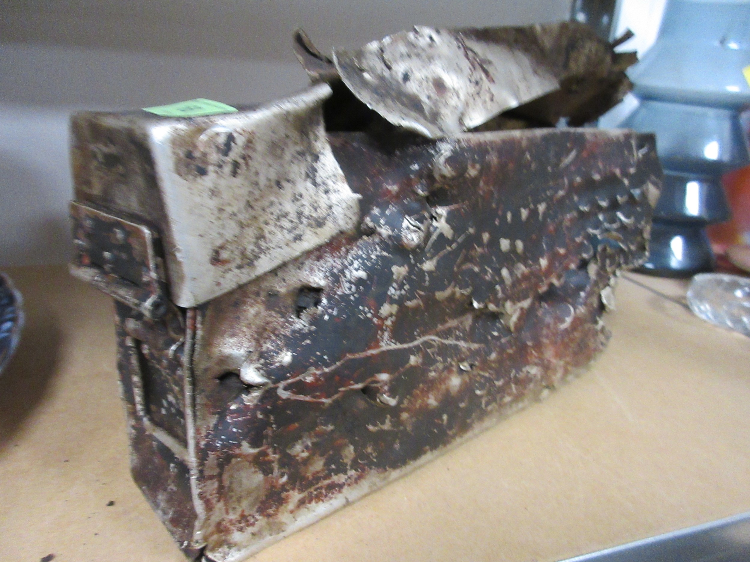 A vintage ammunition can clearly used as target practice at some time ...