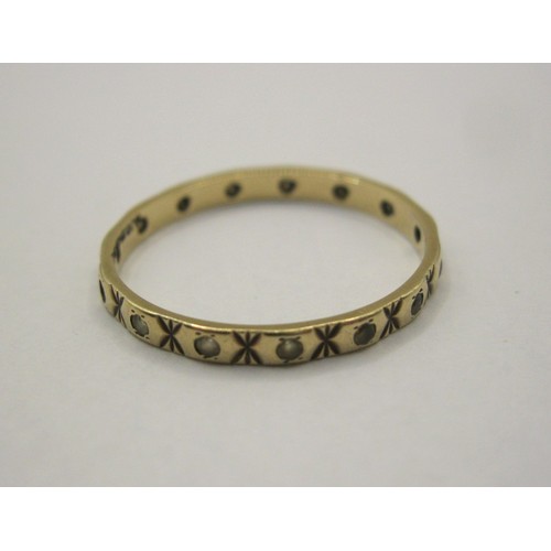 3 - A 9 carat gold eternity style ring set with small white stones, a/f some absent,  gross weight of ri... 