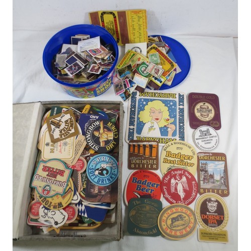 17 - Beer mats and matchbox covers, the contents of a box file and a sweets tub.  Approx. 110 beer mats, ... 