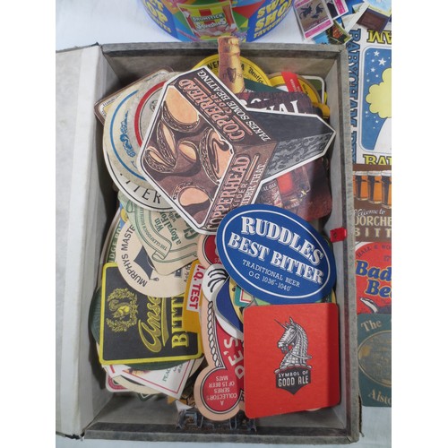 17 - Beer mats and matchbox covers, the contents of a box file and a sweets tub.  Approx. 110 beer mats, ... 
