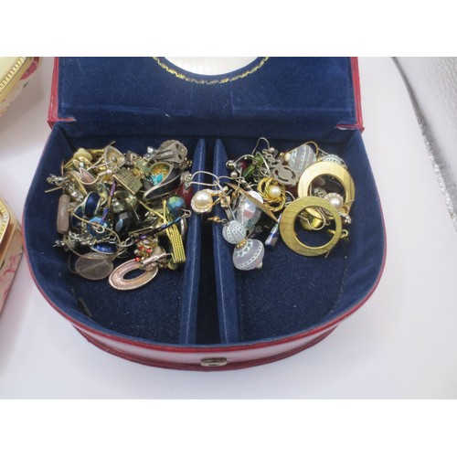 26 - Two jewellery boxes containing approx. sixty pairs of costume earrings