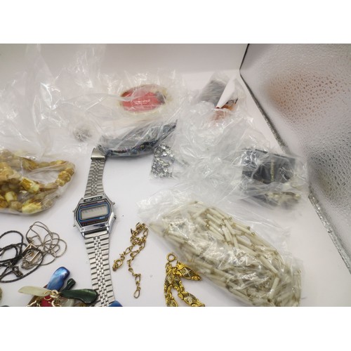 59 - A bag of assorted costume jewellery and a JASA quartz digital wrist watch (a/f requires new battery ... 