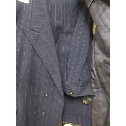 57 - A possible Ralph Lauren or Crombie Double Brested suit Jacket and trousers which looks to be of high... 