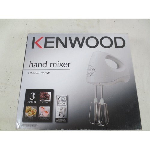 44 - A selection of household appliances to include Hand mixer ,set of kitchen scales, Radio alarm clock ... 