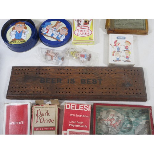 47 - A mixed selection of items to include the following ,Tetley Teafolk coasters ,PG tips Playing cards,... 