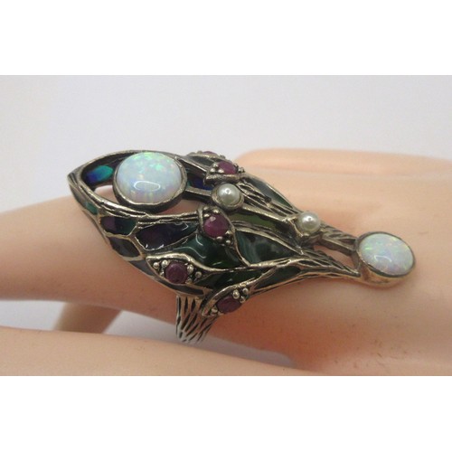 133 - A sterling silver ring with impressive arrangement of faux- and semi-precious gemstones, ring size R... 