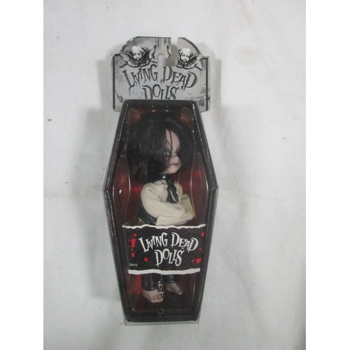 149 - 4 Mezco Living Dead Dolls comprising 93122 Series 17 The Hook, 93201 13th Anniversary Menard, 93065 ... 