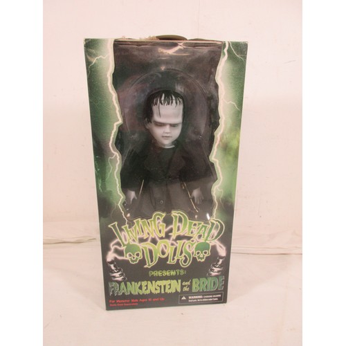 150 - A Mezco 94160 Frankenstein & the Bride figure in retail packaging, sealed and unopened, box dusty wi... 