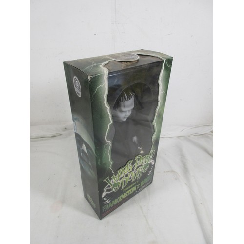 150 - A Mezco 94160 Frankenstein & the Bride figure in retail packaging, sealed and unopened, box dusty wi... 