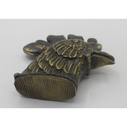 154 - A brass vesta in the form of a large cock's head, the spring-loaded lid released by pressing the bea... 