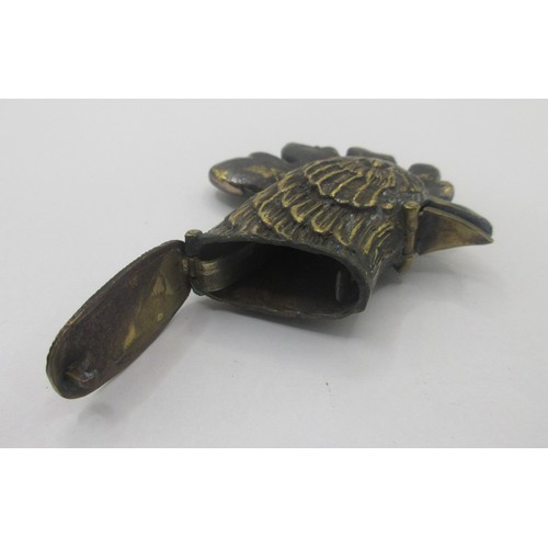 154 - A brass vesta in the form of a large cock's head, the spring-loaded lid released by pressing the bea... 