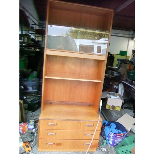 178 - A G-Plan (E Gomme) wall unit with drawers to base, shelving and then glazed to top, internal lightin... 