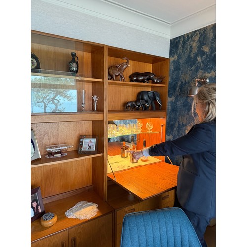 178 - A G-Plan (E Gomme) wall unit with drawers to base, shelving and then glazed to top, internal lightin... 