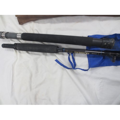 174 - A bundle of fishing rods including fly and beach fishing