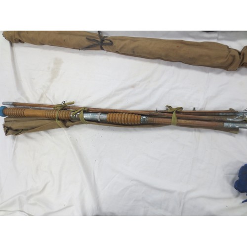 174 - A bundle of fishing rods including fly and beach fishing