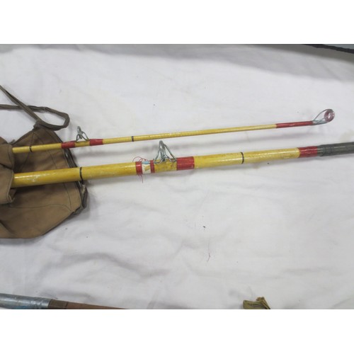 174 - A bundle of fishing rods including fly and beach fishing