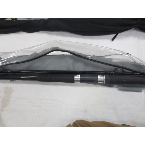 174 - A bundle of fishing rods including fly and beach fishing