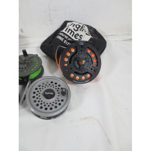 171 - A selection of 8 fishing reels, mainly fly fishing, plus various spools etc