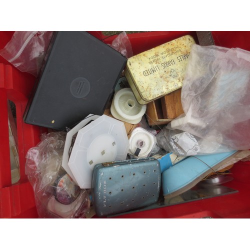 172 - A large red tub containing a mixture of fishing equipment including hooks, line etc