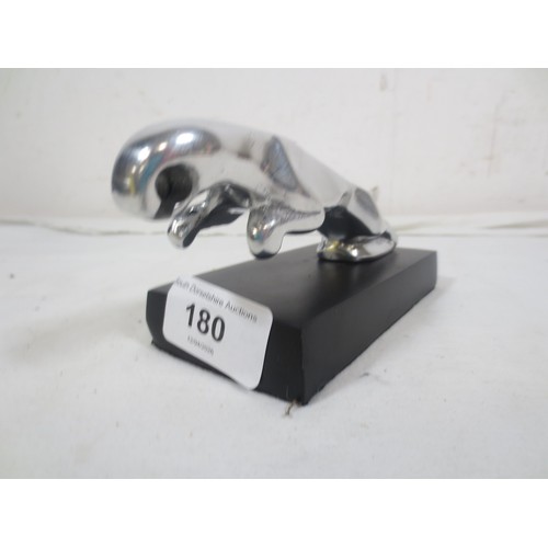 180 - A 'leaping cat' bonnet ornament mounted on a plinth