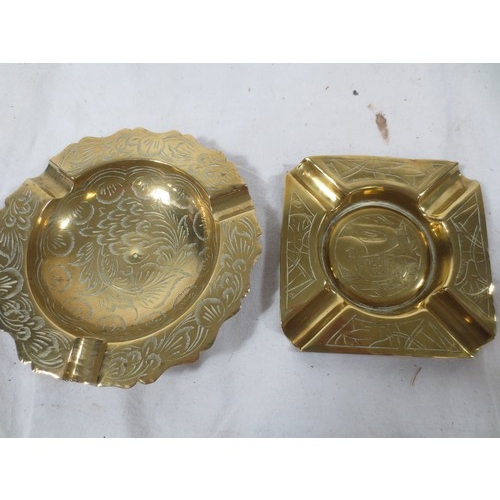 197 - A Chinese wood lined Cigarette box along with two engraved Brass ashtrays .