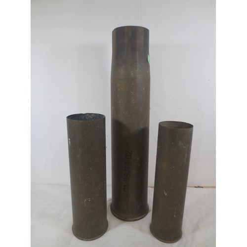 A selection of larger brass shell cases including a 1944 dated 75mm ...