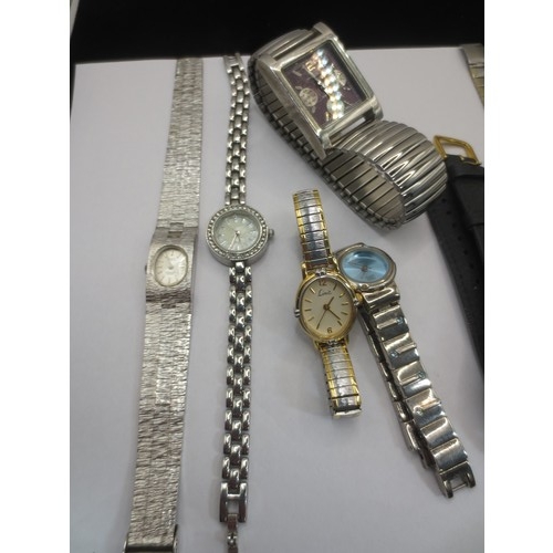 65 - A selection of 12 ladies quartz watches, all in running order bar one