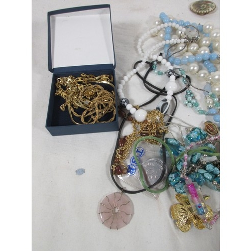61 - A bag of costume jewellery including a small box of gold tone necklaces & bracelets