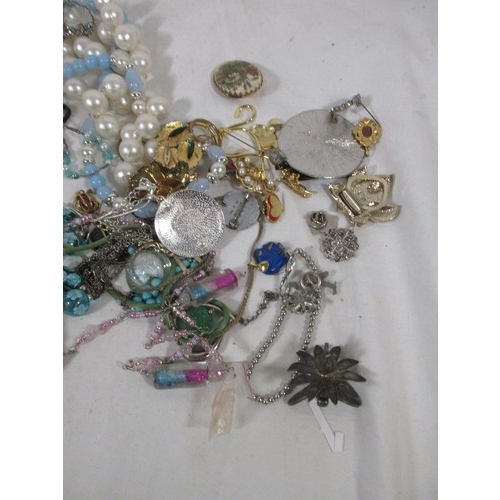 61 - A bag of costume jewellery including a small box of gold tone necklaces & bracelets