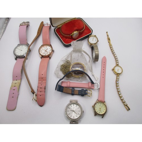 64 - A tub of assorted watches