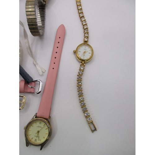 64 - A tub of assorted watches