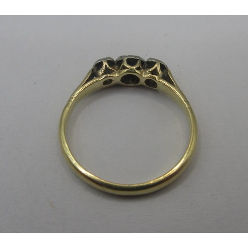 116 - An 18 carat gold sapphire and diamond ring.  A small central sapphire with two diamonds, ring size J... 