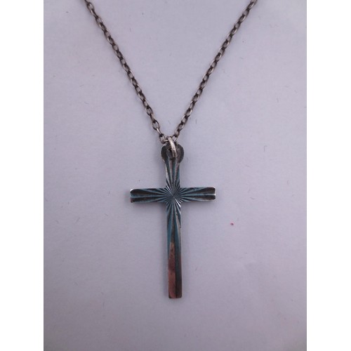 75 - A silver chain and cross pendant,  the clasp stamped sterling, the pendant stamped silver