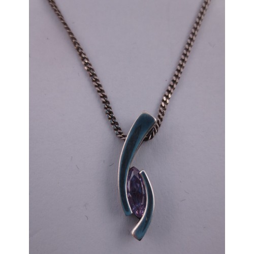 76 - A 925 silver chain and pendant set with a bluish pink stone